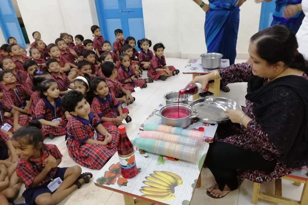Teacher reading to kids